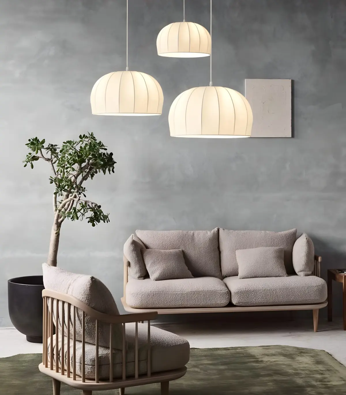 three aeron silk pendant lamp hanging above sofa