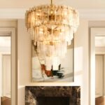 frosted glass chandelier hanging in the center of the ceiling