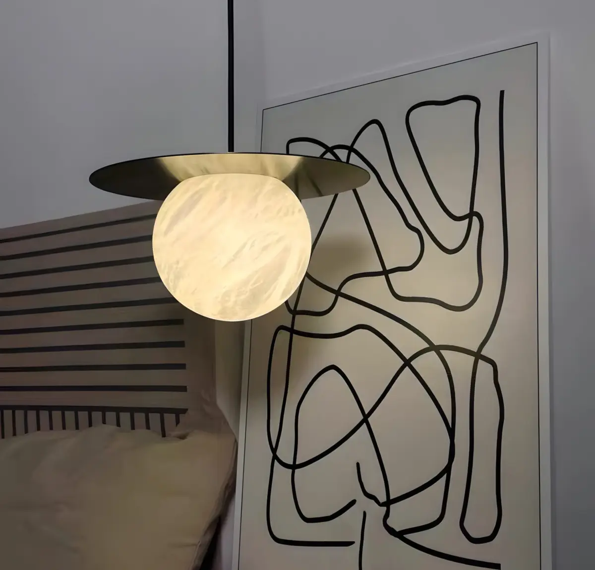 borra moon disk pendant light as a bedside lamp