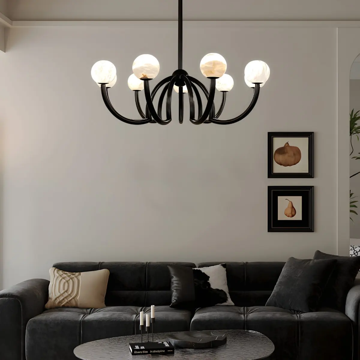 black cluster ball chandelier hanging above a black sofa