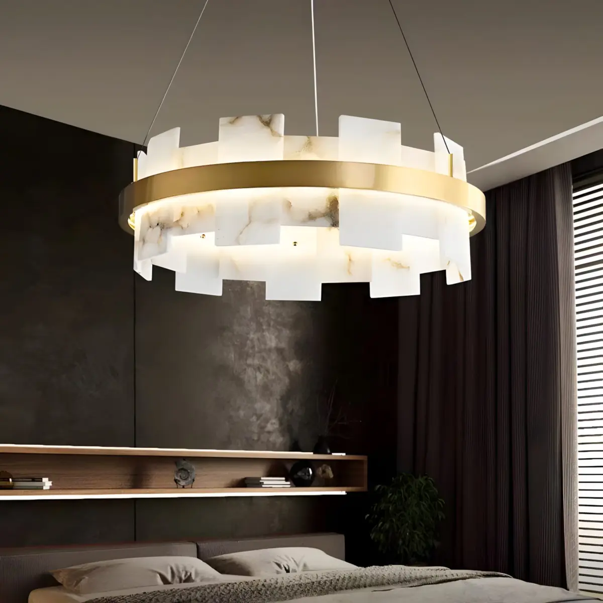 Gold ring chandelier hanging above the bed