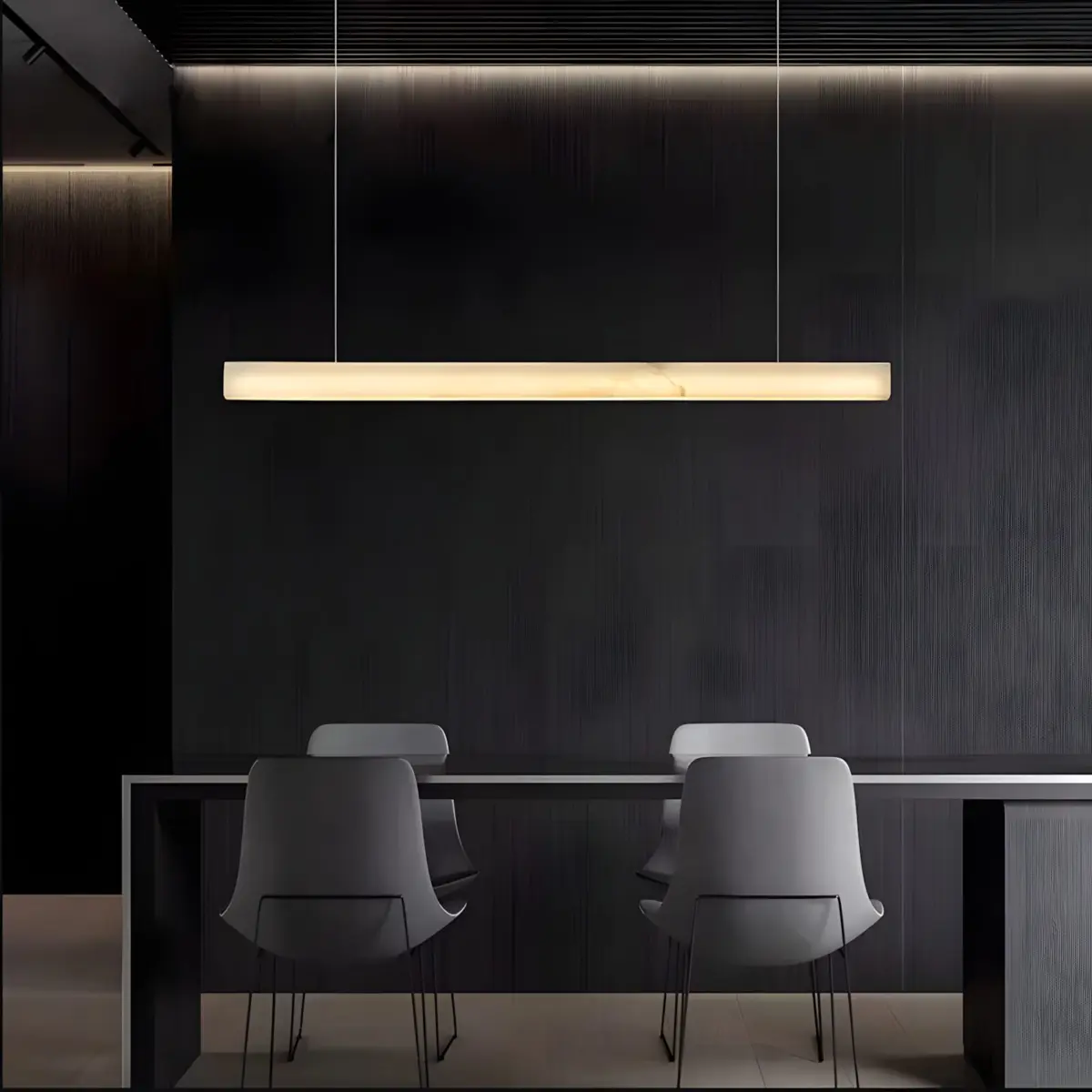 I-linear marble pendant light hanging above table