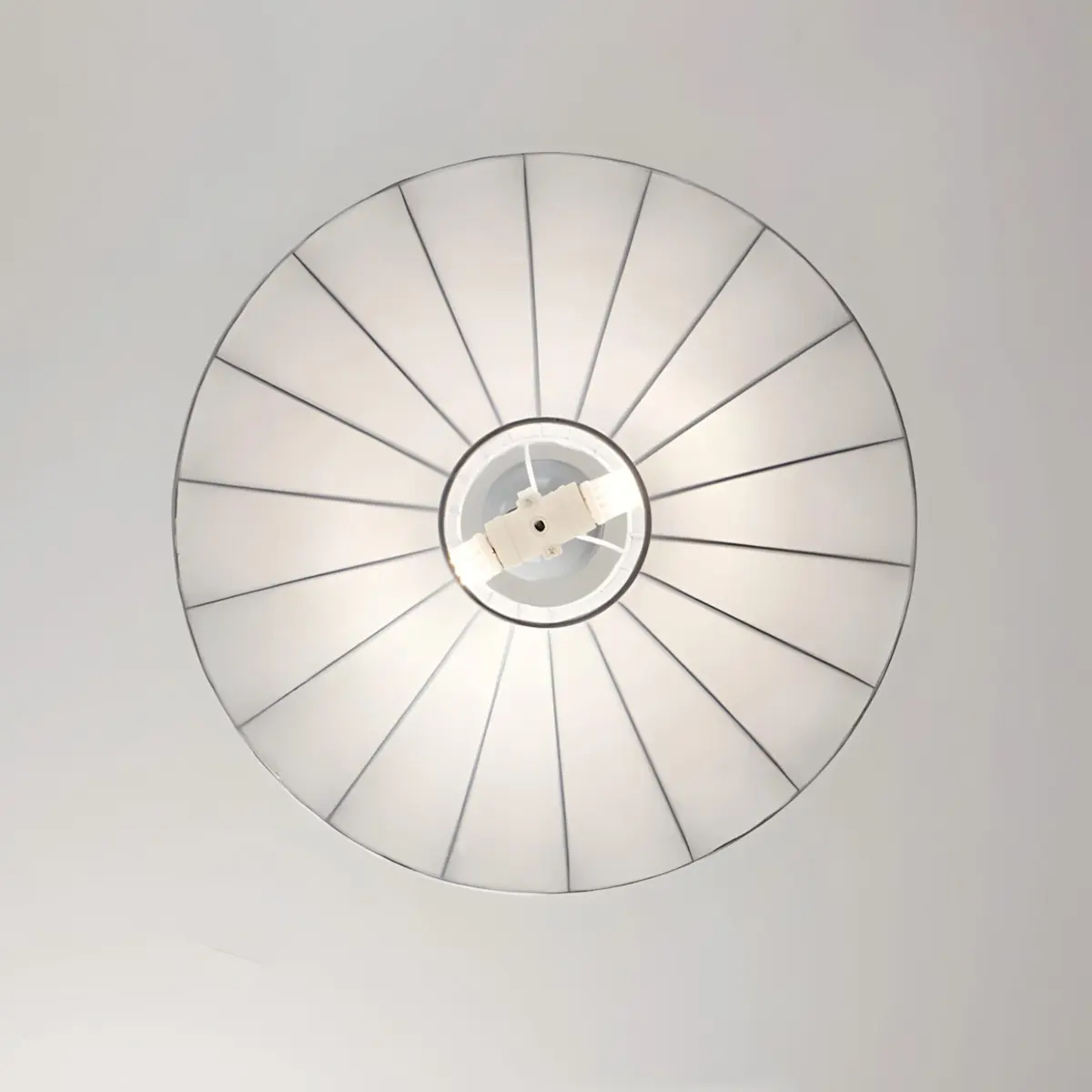 The bottom surface of the lokki saucer silk pendant light