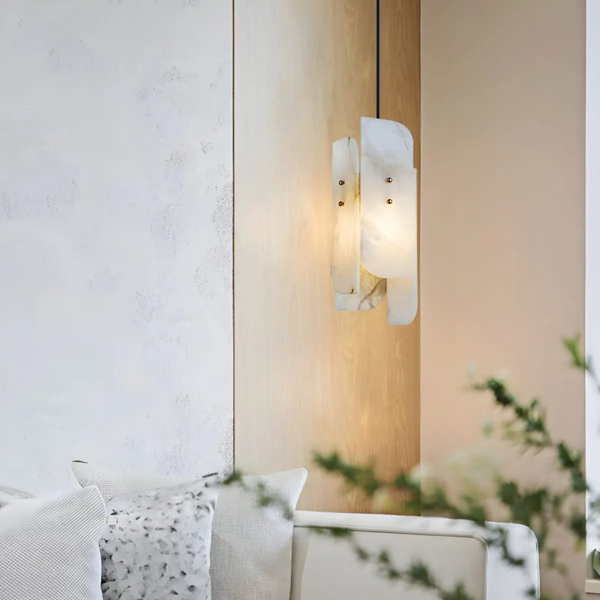 megalith pendant light hanging beside sofa