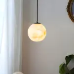 Moon ball pendant light hanging from the ceiling