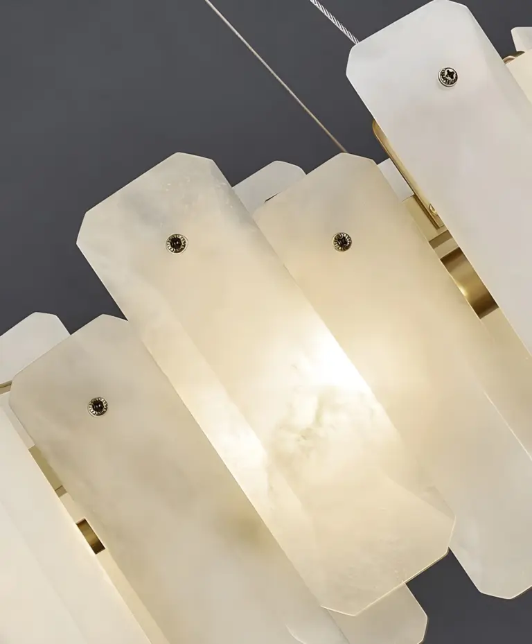noah round chandelier stone slabs are stacked and clustered around