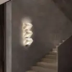 triple sloping block wall lamp in the stairwell