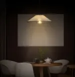 prismatic fabric pendant hanging above table