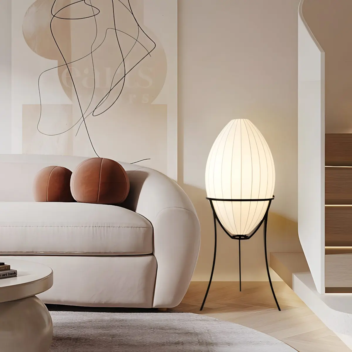 renée egg shaped floor lamp beside a sofa