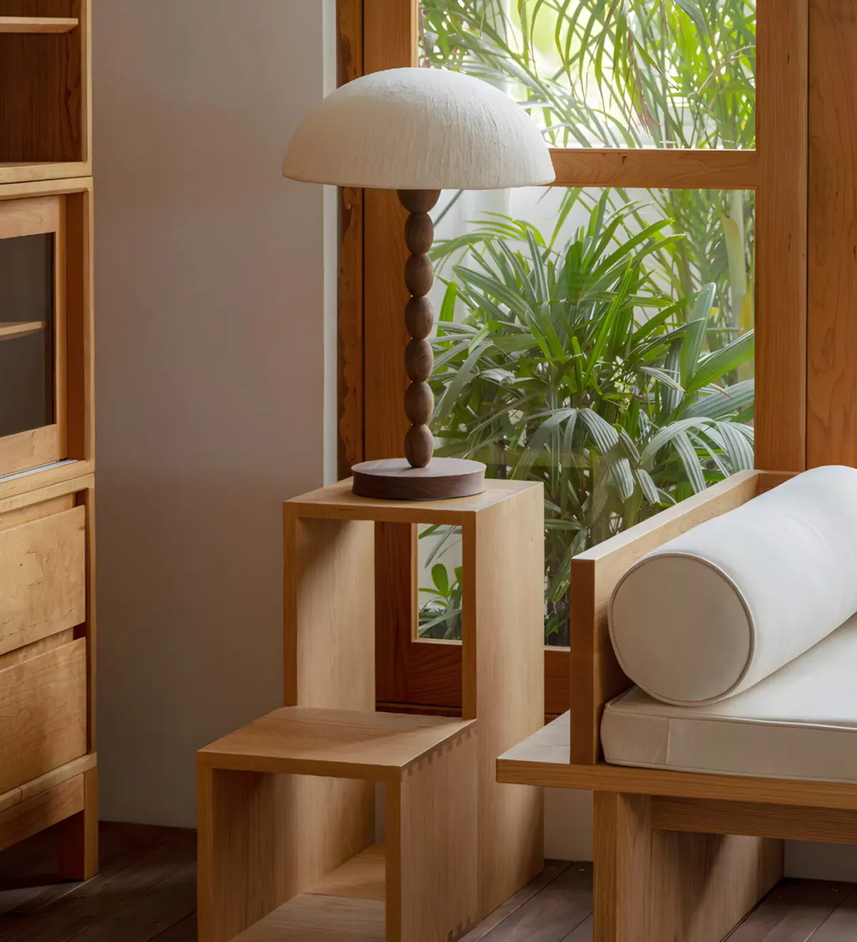 satori table lamp on a wooden stand near window