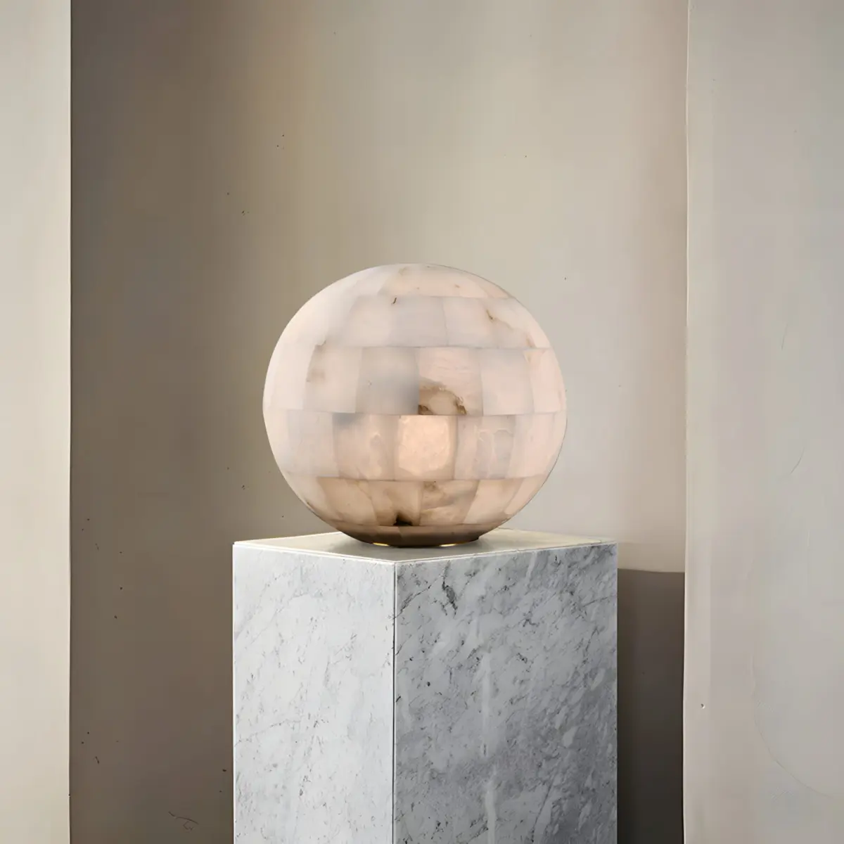 spherical dome table lamp on a marble display stand