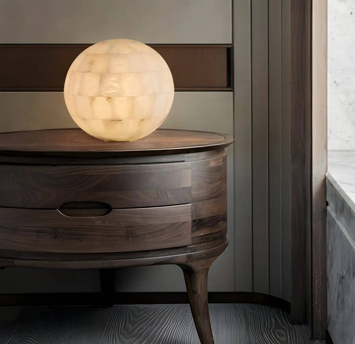 spherical dome table lamp on a wooden side table