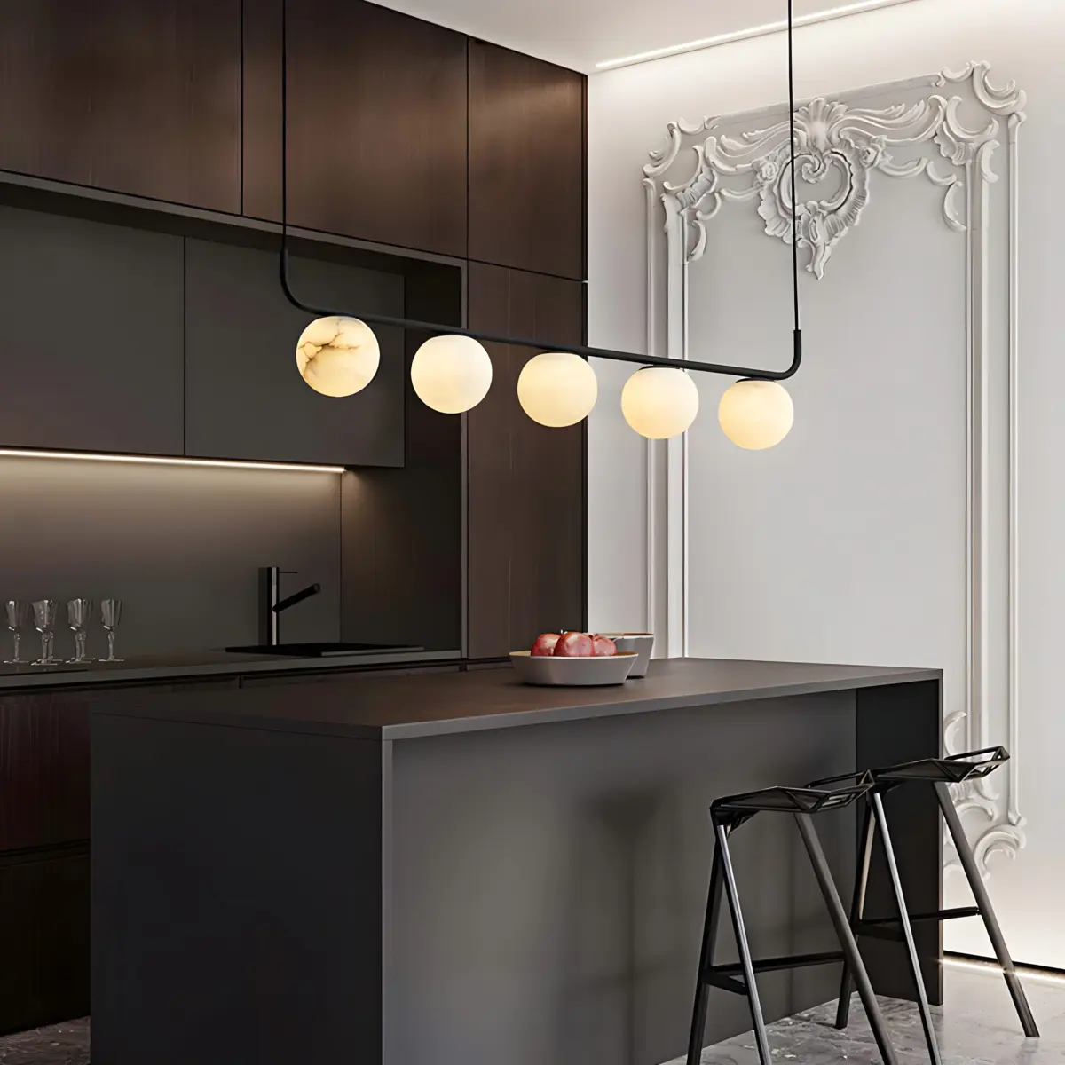 tribeca zara pendant hanging on the kitchen island countertop