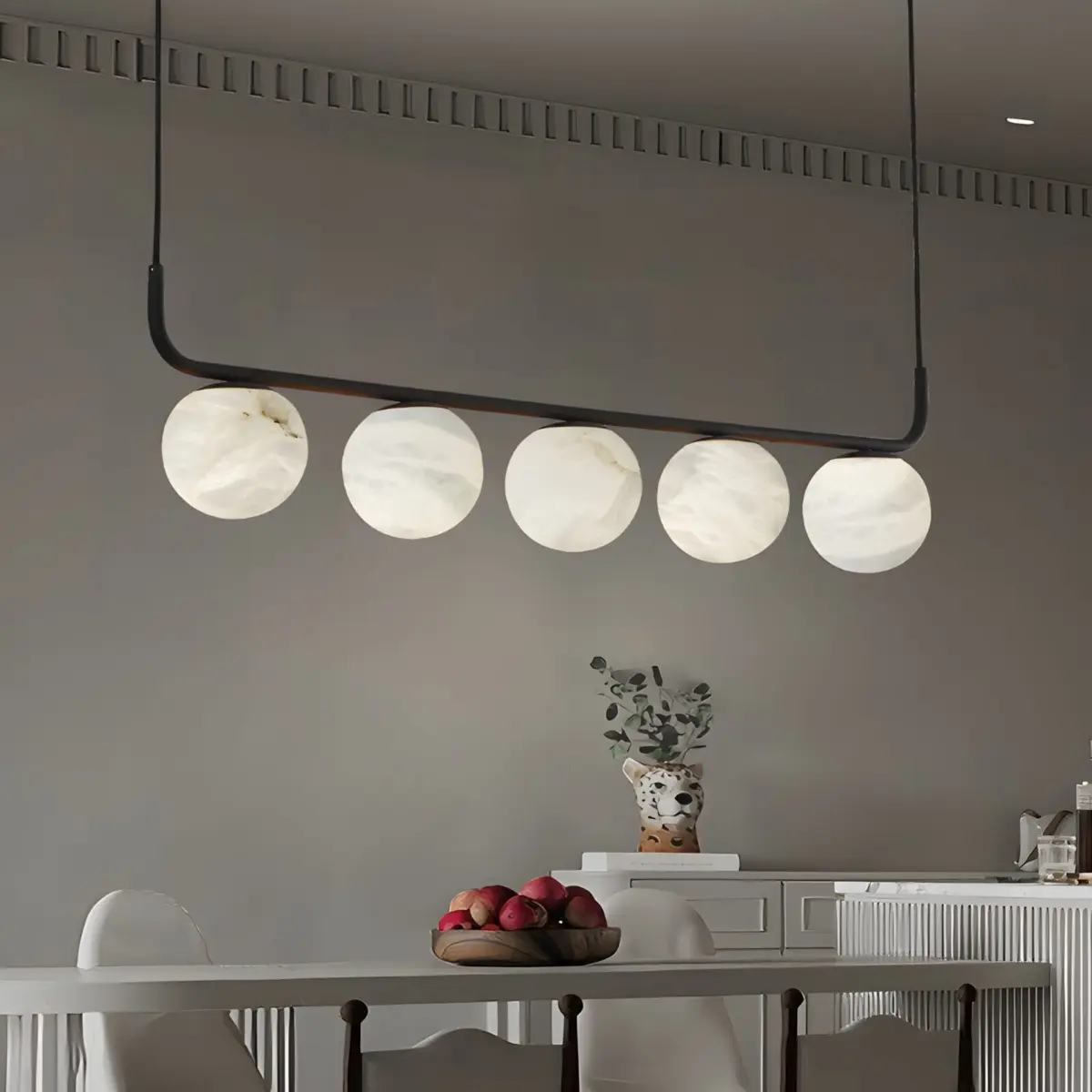 tribeca zara pendant hanging above dining table