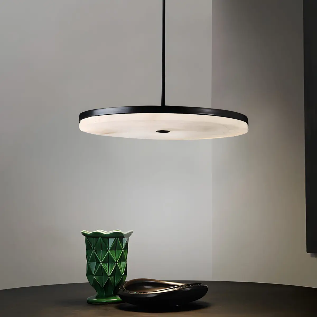 Wyatt pendant light hanging above table