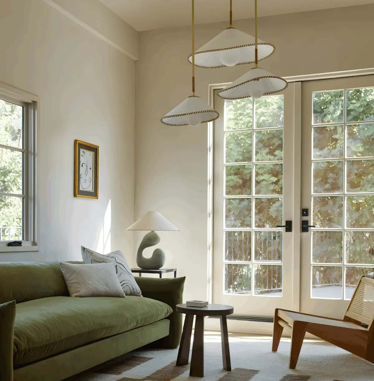three arroyo fabric pendant light group hanging in living room