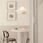 ethereal bloom fabric pendant light hanging above small table