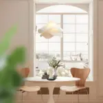 ethereal bloom fabric pendant light hanging beside windows