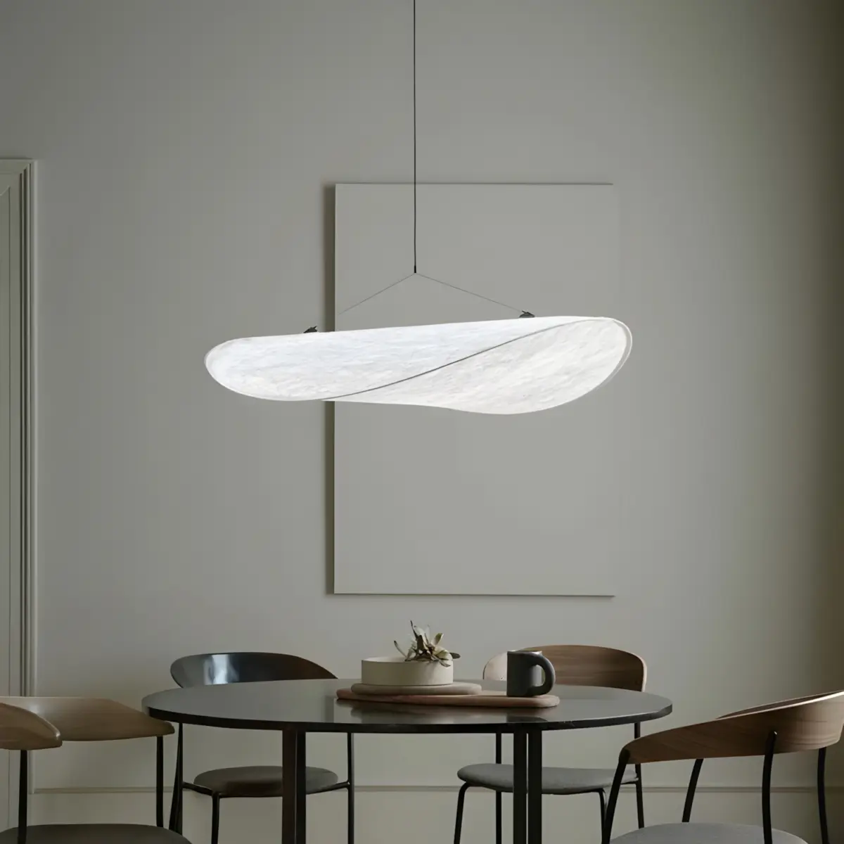 new works silk made pendant lamp hanging above dining table