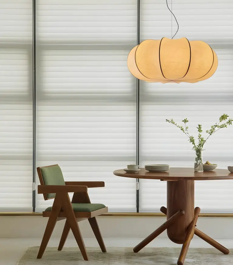 oblate pumpkin shade silk made pendant lamp hanging above dining table