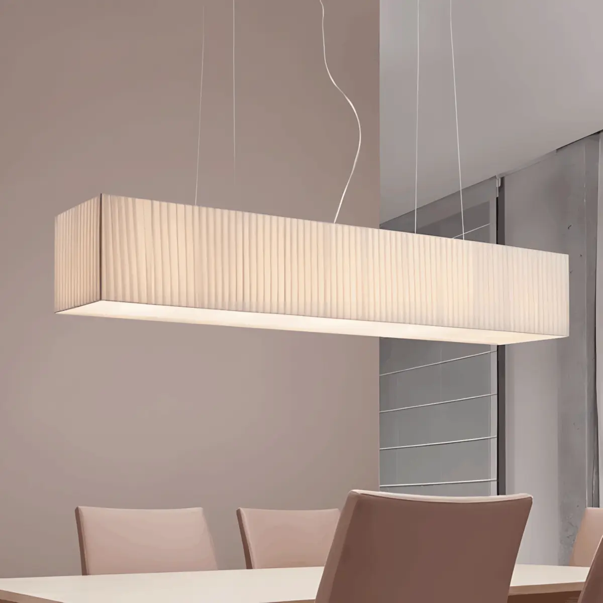 rettangolo large pendant hanging above dining table