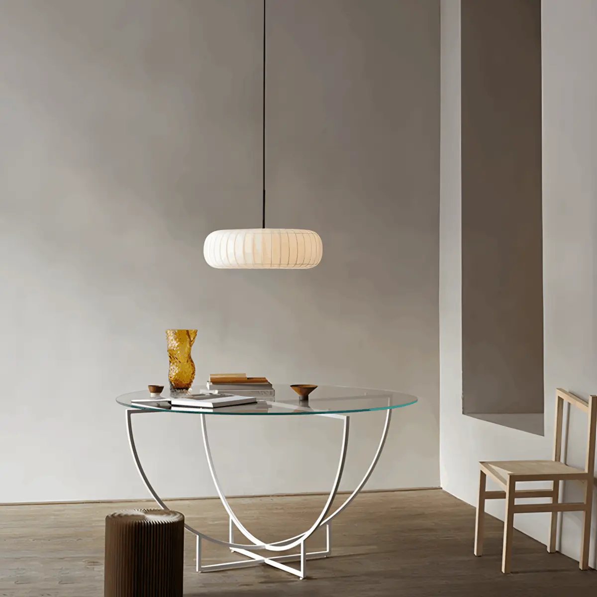 rossau tr36 silk pendant hanging above a glass table