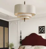 scandinavian pebble fabric pendant light hanging in bedroom