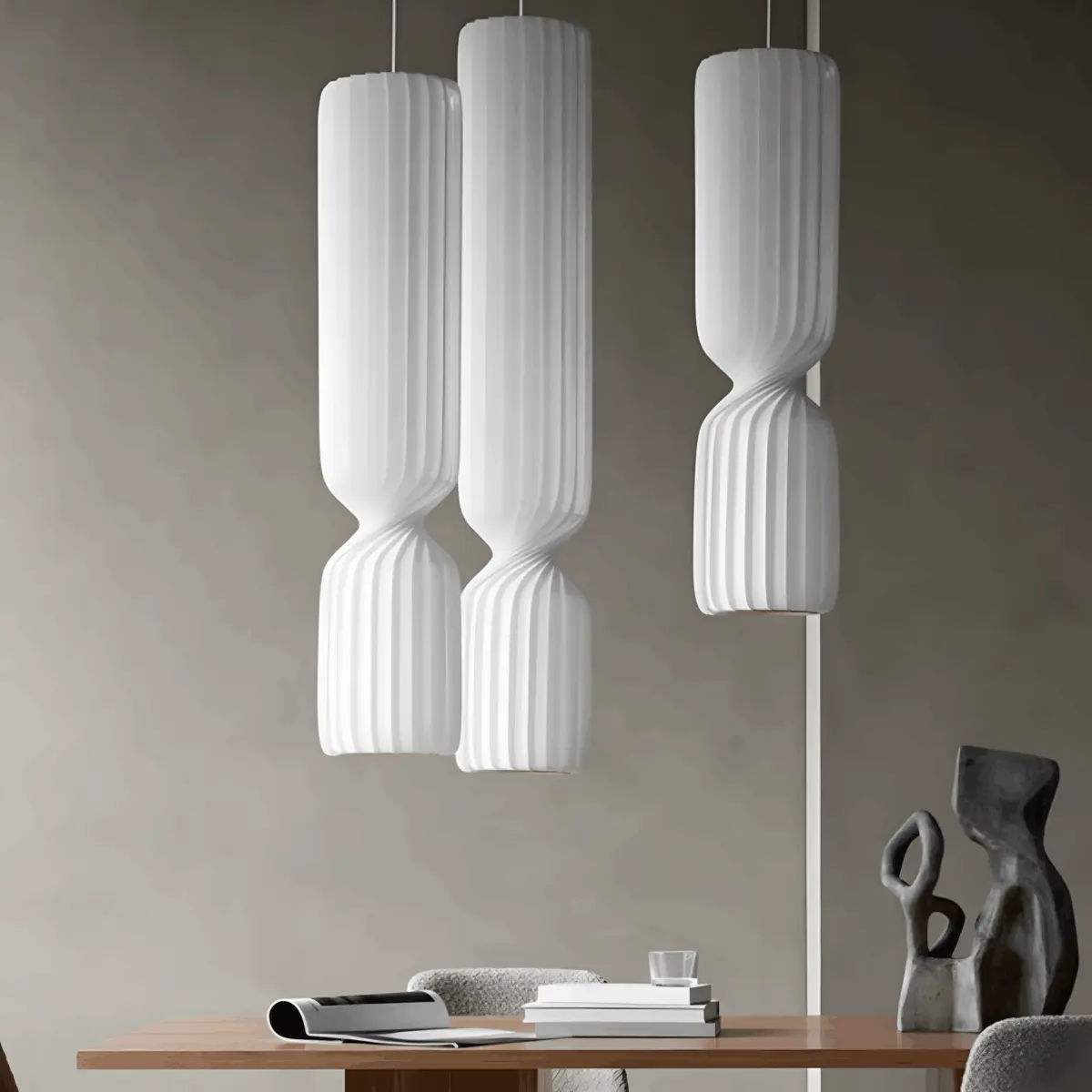 three different size unlighted tom rossau tr41 pendant light hanging