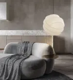 turner silk made pendant lamp hanging beside sofa