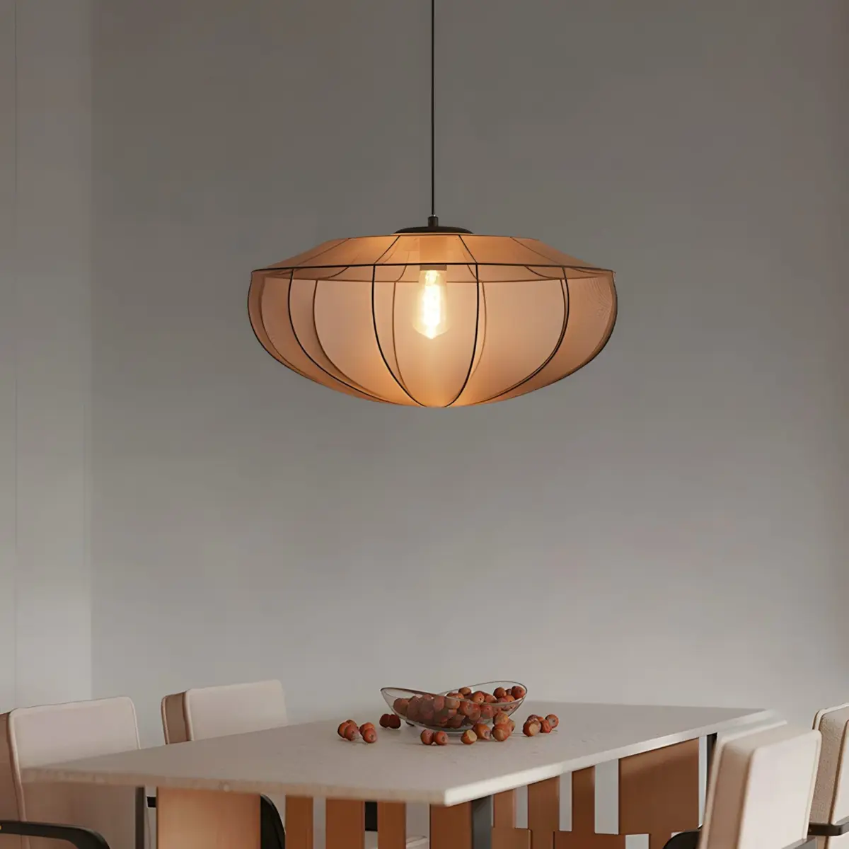 black westwing beau fabric pendant light hanging above dining table