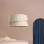 one westwing nyla pendant light hanging in a pink room
